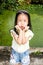 Action Asian little girl wear cute clothes
