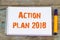 Action plan 2018/ open notebook with inscription action plan , b