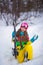 Active adorable preschooler caucasian girl portrait  goggles and bright suit enjoy winter extreme sport activities. Child skiing