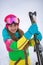 Active adorable preschooler caucasian girl portrait  goggles and bright suit enjoy winter extreme sport activities. Child skiing