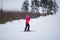 Active adorable preschooler caucasian girl portrait with ski in helmet  goggles and bright suit enjoy winter extreme sport