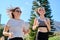 Active athletic family, mother and teenage daughter running together