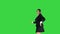 Active attractive girl walking by and dancing on a Green Screen, Chroma Key.