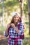 Active attractive woman hiking with backpack