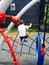 Active boy determined to climb cargo net