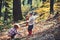 Active children play games on fresh air in autumn forest. Active rest and kids activity outdoor