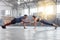 Active couple holding hands for support in pushup, plank and balance training during fitness, workout and exercise in a