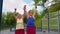 Active elderly sports team athletes putting arms hands together, cheering and ready to win, smiling