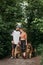 Active Family, fitness couple, Pet Love, Dog Training, best dog breeds for family. Young sports couple walking with two