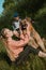 Active Family, fitness couple, Pet Love, Dog Training, best dog breeds for family. Young sports couple walking with two