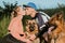 Active Family, fitness couple, Pet Love, Dog Training, best dog breeds for family. Young sports couple walking with two