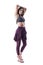 Active fit healthy lifestyle woman in sporty clothes doing triceps stretching over head.