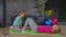 Active fit mom doing sit ups with help of daughter