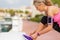 Active girl tying trainers before running exercise outdoors