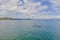 Active happy family having fun together enjoying adventurous experience kayaking on the sea on a sunny day during summer