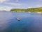 Active happy family having fun together enjoying adventurous experience kayaking on the sea on a sunny day during summer