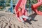 Active happy funny smiling Caucasian boy child sliding on playground schoolyard outdoors on summer sunny day. Kid having fun.