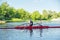 Active healthy lifestyle teens. Boys paddling sport kayak