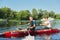 Active healthy lifestyle teens. Boys paddling sport kayak