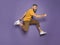 Active jumping man on color background