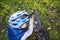 Active leisure for children in the park. A child is studying the mechanism of a mountain bike. Toddler fixing a bike in the forest