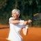 Active Lifestyle Seniors â€“ Positive Mature Woman Playing Tennis Recreationally