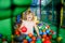 Active little girl playing in indoor playground. Happy joyful preschool child climbing, running, jumping and having fun