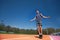 Active male athlete skipping the rope outside