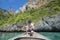 Active man on thai traditional longtail Boat is ready to snorkel and dive, Phi phi Islands, Thailand