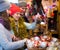 active married couple with a teenage daughter at Christmas market