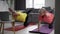 Active mature couple performing balance exercise by online workout lessons using laptop