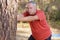 Active middle aged man doing morning workout at morning