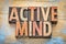 Active mind word abstract in wood type