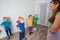 Active and motivated kids doing sport exercises at kindergarten