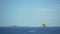 Active people parasailing, smiley parachute flying above sea surface, good mood