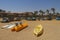 Active rest, sport, kayak. Boat for rafting on water. A few kayaks stand on beach. Beautiful tropical beach with palm trees,