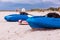 Active rest, sport, kayak. Boat for rafting on water. A few kayaks stand on a sandy beach.