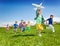 Active running kids with boy holding airplane toy
