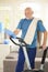 Active senior with fitness equipment