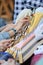 Active senior people workshop with traditional bobbin lace crochet. Hands detail and empty copy space