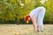 Active senior woman doing gymnastics