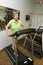 Active Senior Woman Exercise Treadmill Machine