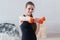Active sportive athletic woman boxing dumbbells