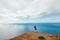 Active traveller man dressed black T-shirt enjoying Atlantic ocean view on the western peninsula point of Madeira island - Ponta