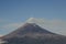 Active volcano Popocatepetl, fumarole over blue sky Popocateptl active volcano, blue sky
