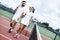 Active weekend together. Lovers play tennis