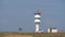 An active white Marine lighthouse on the steppe coast.