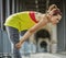 Active woman catching breath after exercise on bridge in Paris