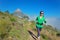 Active woman runner runs trail