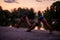 Active Women Training Together in Green Park at Night